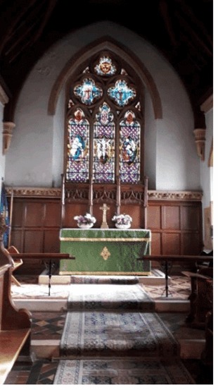 Chancel window and altar at St Mary’s Church, Widford